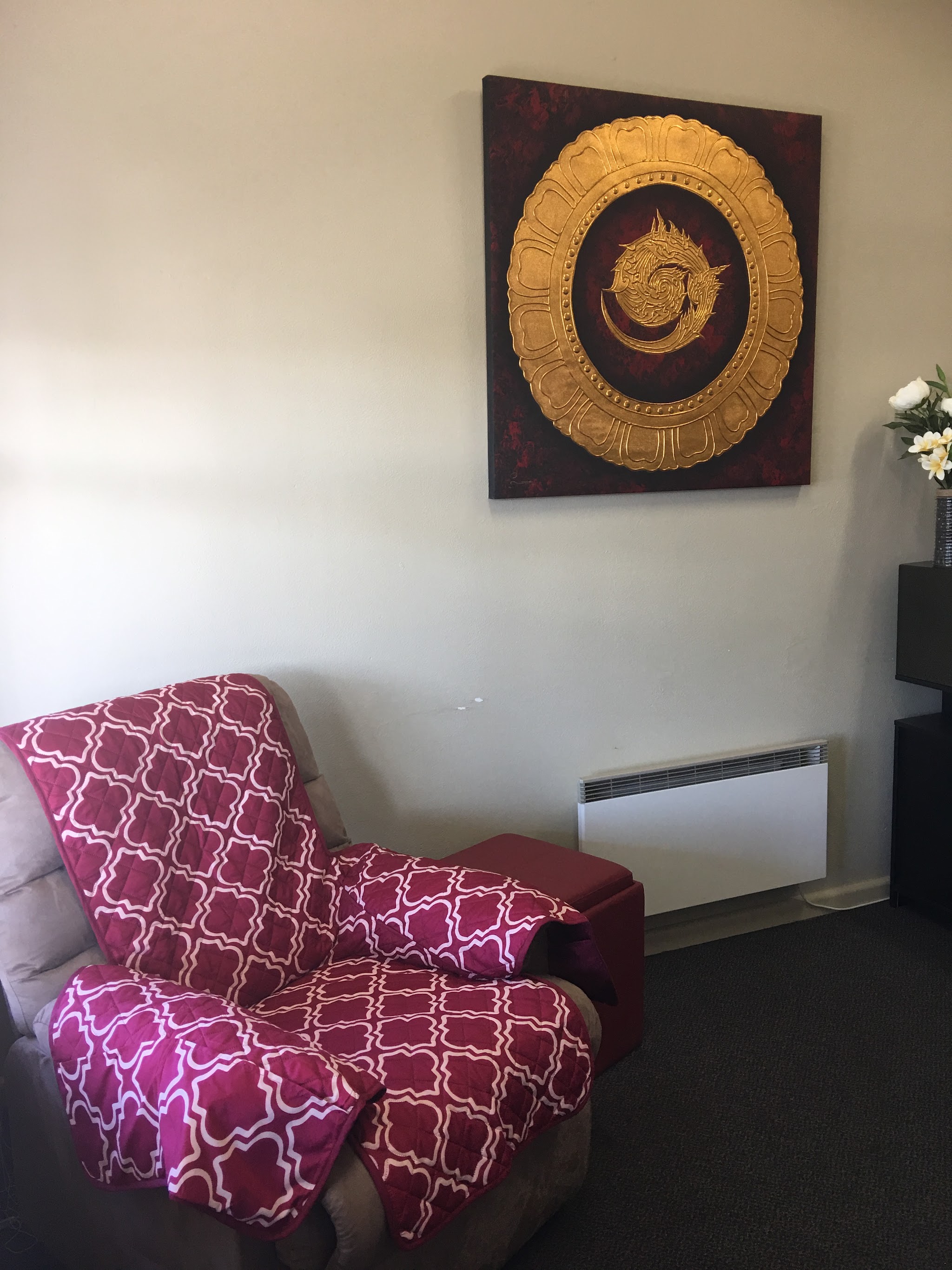 The relaxation corner with fresh flowers on a side table